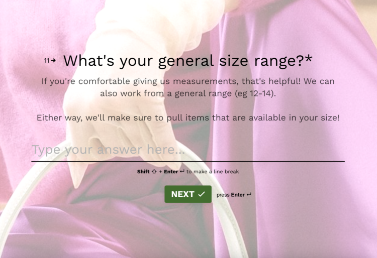 A screenshot from the Fashivly style survey. The background image is of a woman's hand holding the handle of a handbag. The text on the screen says What's your general size range? If you're comfortable giving us measurements, that's helpful! We can also work with a general range (eg 12-14). Either way, we'll make sure to pull items that are available in your size!